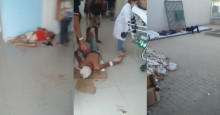Pacientes esperam atendimento em chão ensanguentado de hospital
